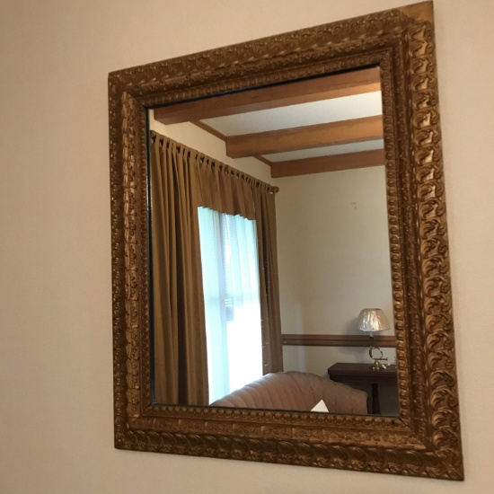 Antique Mirror with Ornately carved Gilt Wooden Frame