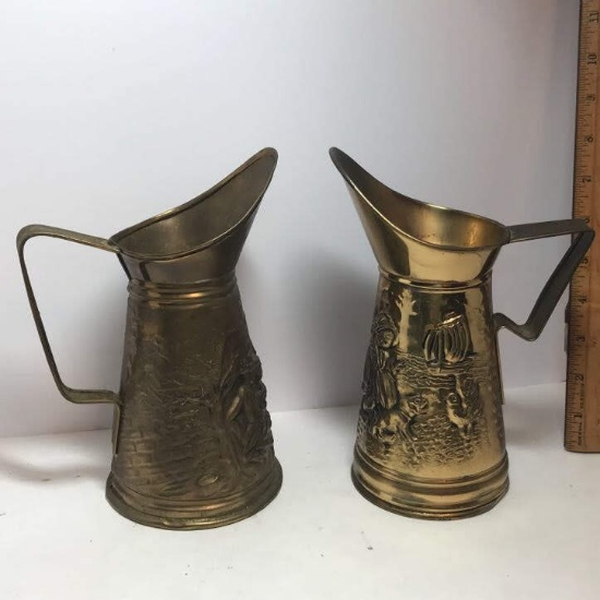Pair of Vintage Embossed Brass Pitchers