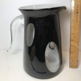 Large Black Art Glass Pitcher with White Interior & Clear Handle