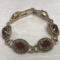 Gold Tone Sarah Coventry Bracelet with Red Stones