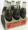 Vintage Metal Coca Cola Handled Carrier with Vintage Unopened Bottles