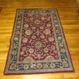 Oriental Style Area Rug with Wine Background with Blue/Cream/Gold Patterns