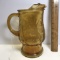 Amber Glass Pitcher with Embossed Daisy