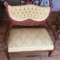Antique Tufted Back Carved Cherry Love Seat