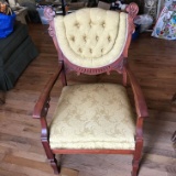 Antique Tufted Back Carved Cherry Arm Chair