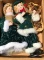 Pair of Porcelain Christmas Carolers Dolls