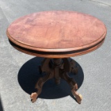 Vintage Round Table with Ornately Carved Base