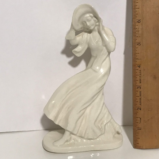 Porcelain Figurine of Woman on a Blustery Day - Made in Japan
