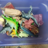 Tote Full of Plastic Dinosaur Toys