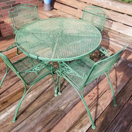 Wrought iron patio set with 4 chairs