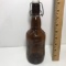 Brown Glass “Grolsch” Embossed Bottle with Top