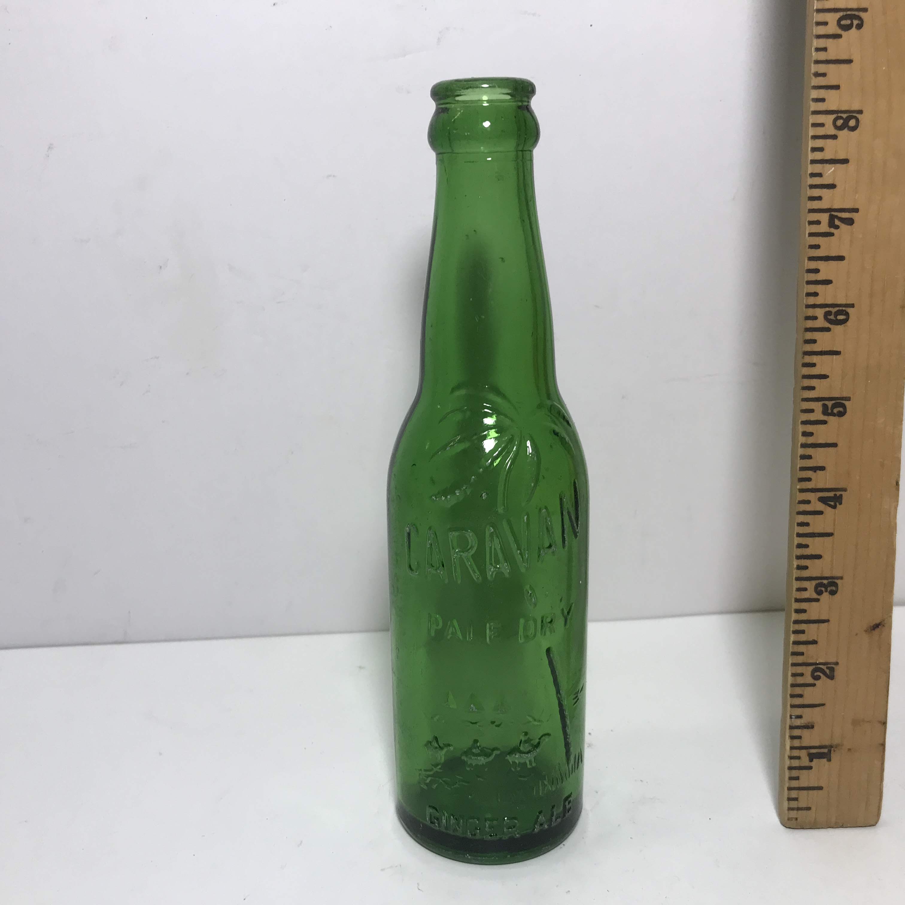 Green Glass Caravan Pale Dry Ginger Ale Bottle | Proxibid