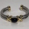 Gold and Silver Toned Bracelet with Black Synthetic Stone in Center