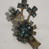 Vintage Gold Toned Floral Brooch with Turquoise Colored Stones
