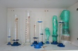 Eleven Liquid Measuring Graduated Cylinders