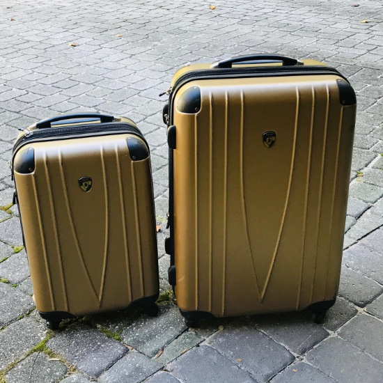 Pair of HEYS Hard Rolling Suitcases