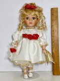 Pretty Porcelain Doll on Stand