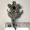 Silver Tone Flower Brooch with Black Crystal Center