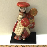 Vintage Handpainted and Decorated Porcelain Geisha Figurine on a Wooden Base