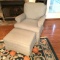 Light Blue Arm Chair with Rolling Footstool