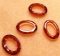 Lot of Donut Swarovski Beads   (4 count; Oval Shaped; No Color Listed, Burnt Orange)