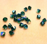 Lot of Swarovski Bicone Beads: 8mm Emerald AB