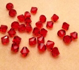 Lot of Swarovski 8mm Bicone Beads - Red Light Siam