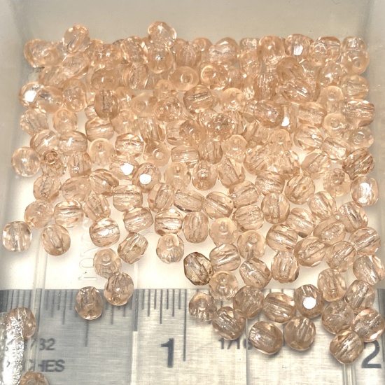 Lot of Swarovski Crystal Beads: No Color Listed (peach/pink tone)