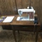 Vintage Singer Sewing Machine in Wooden Table  