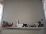 Lot of Decorative Items on Top of Mantle