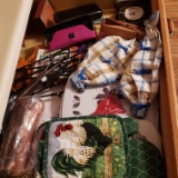 Drawer Lot of Trivets, Towels, and Miscellaneous Items