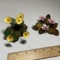 Pair of Metal Floral Arrangements one on Wood