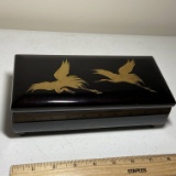 Black Lacquer Musical Jewelry Box with Gilt Crane Top