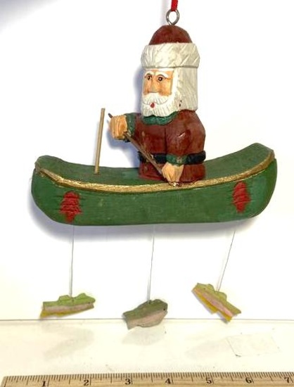 Carved Wood Santa in Canoe with Fish Ornament