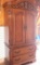 Beautiful 2 Piece Oak Finish Armoire with Metal Detail, 2 Drawers on Bottom and Shelf for Clothes