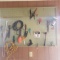 Contents on Pegboard In Garage, Tools, Shop Light, Bulb Planter, More