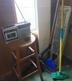 Lot of Items on Corner of Garage, Wood Bar Stool, Rake and More