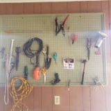 Contents on Pegboard In Garage, Tools, Shop Light, Bulb Planter, More
