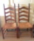 Lot of 2 Vintage Ladder Back Woven Seat Chairs