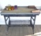 Wicker Patio Table With Galvanized Tray On Top, and Glass Candle Holders