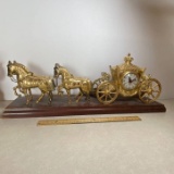 Brass Tone Horse & Chariot Clock on Wood Base