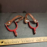 Vintage Red Metal Cowboy Spurs with Leather Straps