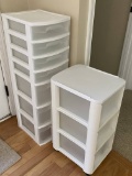 Pair of White Plastic Organizers - One on Casters