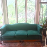 Vintage Upholstered Sofa with Wood Trim and Claw Feet