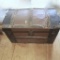 Antique Wooden Camel Back Trunk Full of Miscellaneous Fabric