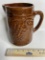 Vintage Pottery Pitcher with Embossed Grape Design