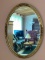 Vintage Oval Mirror with Ornately Carved Wooden Frame