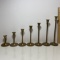 Set of 7 Graduated Brass Candlesticks