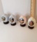 Lot of 4 M.J. Hummel Porcelain Egg Figurines on Wooden Bases
