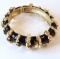 Thick Gold Tone Hinged Bracelet with Black Enamel